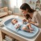 Saltea de înfășat Cangaroo Nuvia blue din EVA impermeabil, cu centură, înclinare antireflux și scală măsurare, 0-12 luni